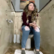 A Portuguese girl sits on a toilet, pisses, farts and shits with several small, hard plops. She wipes when finished. Presented in 720P HD. Over 4.5 minutes.